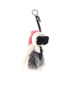 VINTAGE, RRP AS NEW
 Playful and iconic, the **Fendi Karlito Bag Charm** in multicolor fur adds a whimsical touch to any handbag with its fun design inspired by Karl Lagerfeld. Crafted from luxurious fur and detailed with mini sunglasses and a leather tie, it’s a bold accessory that doubles as a conversation starter.
**Styling Tip:** Clip it onto a classic leather tote or backpack to instantly elevate your look with a dose of personality and high-fashion flair.

Fendi Karlito Bag Charm in Multicolor Fur

Condition: Excellent
Signs of wear:  No sign of wear.
Packaging: None
Color: Multicolor | multicolor
Material: Fur | fur
Size: One Size | One Size
Measurements: 
SKU: NAPPUGBAC536819W