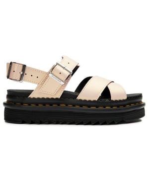 Dr Martens Voss platforms in light pink offer a bold summer statement. These leather sandals combine the brand's rebellious heritage with practical comfort, featuring their iconic air-cushioned sole that absorbs impact with every step. The Goodyear-welted construction ensures durability while the synthetic lining prevents discomfort on warmer days. Chunky yet lightweight, these platforms deliver that unmistakable Dr Martens attitude with adjustable straps for a secure fit throughout your day.