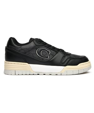 The Coach Soho black trainers blend luxury with everyday casual style. Crafted with premium leather uppers, these court-inspired shoes offer sophisticated flair for your casual wardrobe. The durable rubber sole provides reliable traction while maintaining a sleek profile. Perfect for pairing with jeans or dresses, these versatile trainers showcase Coach's commitment to quality craftsmanship with subtle branding that elevates your look without overwhelming it. A refined choice for the fashion-conscious woman.