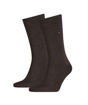 
Tommy Hilfiger Sokken zijn de perfecte bruine basics met een elegant patroon. Deze comfortabele sokken zijn gemaakt van zacht katoen en mixmateriaal, bieden een fijne pasvorm en zijn onmisbaar in je collectie. Tommy Hilfiger staat voor tijdloze stijl en kwaliteit. - Over het merk: De Amerikaanse college-uitstraling is het meest kenmerkend voor Tommy Hilfiger. De klassieke maar moderne kledingstukken van het merk zijn sportief, casual en gekleed!