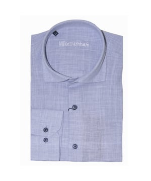 
<p>Katoenen heren overhemd met een linnen look van Mike Turnham.</p>
<ul>
<li>Slim fit</li>
<li>100% Katoen</li>
</ul>