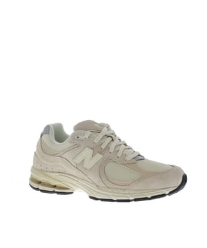 
New Balance 108662 in de kleur Taupe.
