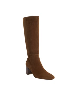 Step into timeless sophistication with Salfie. Crafted from premium leather, this knee-high boot is elevated on a comfortable mid-height stacked block heel. The chisel toe adds a refined edge, while the inside zip ensures ease of wear. A versatile wardrobe classic designed to pair effortlessly with everything from tailored skirts to relaxed denim.