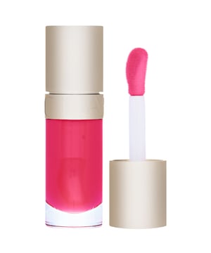 Discover the luxurious Clarins Lip Comfort Oil, now featuring an elegant new packaging. This nourishing lip oil is enriched with plant-based active ingredients, offering a unique non-sticky formula that hydrates and soothes your lips. Enjoy a subtle taste and a glossy finish that enhances your natural beauty. Perfect for everyday wear, you can apply it alone or layer it over your favorite lipstick for an added shine boost. Treat your lips to the comfort they deserve with this 7 ml beauty essential.
