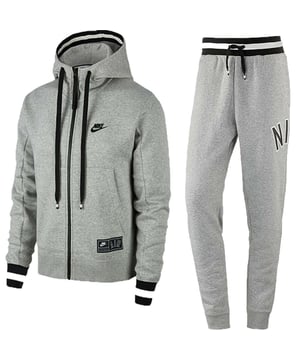 The Nike Air Men's Zip-Through Tracksuit Set in grey features a drawstring hood, zip closure, and embroidered Swoosh logo. It includes printed branding, a split kangaroo pouch pocket, woven brand patch, and ribbed cuffs and hem for a snug fit. The joggers have an elasticated waistband with an adjustable drawstring and ribbed cuffs at the ankles for added comfort and a streamlined look.