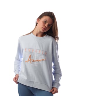 Dames Emporio Armani Crewneck Sweatshirt in blauw.- Geribde crewneck.- Geribde manchetten en zoom.- Logo op de voorkant.- Normale pasvorm.- 100% Katoen.- Ref: 7V2M8A249Z0703