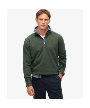 
Deze donkergroene sweater voor heren van het merk Superdry is een must-have voor je kledingkast. Gemaakt van 60% katoen en 40% polyester, biedt deze sweater zowel comfort als kwaliteit. Het zachte materiaal voelt heerlijk aan op de huid en de combinatie van katoen en polyester zorgt ervoor dat de sweater zijn vorm en kleur behoudt, ook na meerdere wasbeurten.en#10;en#10;De sweater heeft een casual uitstraling dankzij de relaxte pasvorm en de diepe groene kleur. Hierdoor is hij perfect voor zowel een casual dagje uit als een avondje uit met vrienden. De sweater is voorzien van een subtiel Superdry logo op de borst en een klein logo op de mouw, wat zorgt voor een stoere touch.en#10;en#10;Draag deze sweater op een jeans voor een trendy look of combineer hem met een chino voor een meer geklede uitstraling. Hoe je hem ook combineert, deze sweater zal zeker een favoriet worden in je garderobe. Bestel hem nu in onze webshop en laat hem snel en gratis thuis bezorgen.