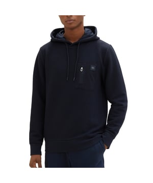 
<p>Stoere donkerblauwe heren hoodie van Tom Tailor.</p>
<ul>
<li>Regular fit</li>
<li>81% Polyester/ 17% Viscose/ 2% Elasthan</li>
<li>Kleurnummer: 10668</li>
</ul>