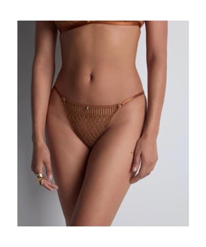 
Stardust Dream String | Materiaal info: 45% Polyester 40% Polyamide 15% Elastaan | Wasinstructie: Handwas niet geschikt voor de droger