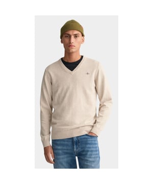 
Gant Pullover Beige Classic Cotton V-Neck 8030562/291 met artikelcode8030562/291 .  van het materiaal 100% Katoen. Extra specificaties: , , , , kleur Beige.