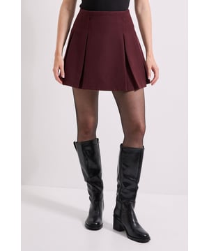 Stylish mini skirt featuring elegant pleated detailing for added movement and dimension
        High-waisted design creates a flattering silhouette that accentuates your natural waistline
        Versatile woven fabric offers structure whilst maintaining comfort for all-day wear
        Classic A-line shape provides a timeless look that pairs effortlessly with various tops
        Perfect length for modest yet fashionable styling, ideal for the Dorothy Perkins woman
    
    This charming pleated mini skirt offers the perfect balance of sophistication and playfulness for your casual wardrobe. The structured pleats create beautiful movement as you walk, whilst the high-waisted cut flatters your figure without revealing too much. Style with a fitted black top and knee-high boots for a chic autumn look, or pair with a coordinating jacket for a polished ensemble perfect for brunch with friends. During warmer months, team with a lightweight blouse and ballet flats for family gatherings or weekend outings. The versatile design makes it an excellent choice for baby showers when paired with a delicate cardigan and simple accessories. This skirt transitions seamlessly from day to evening, offering the contemporary Dorothy Perkins woman a wardrobe staple that combines trend-conscious style with practical comfort.
