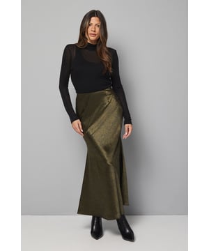 Luxurious satin bias cut design creates an elegant drape that flows with movement
        Flattering maxi length offers sophisticated coverage whilst maintaining a contemporary silhouette
        Sleek, streamlined fit that gently skims the body for a refined daytime look
        Versatile design that transitions effortlessly from casual to smart-casual occasions
        Subtle sheen fabric catches the light beautifully, adding dimension to your ensemble
    
    This sophisticated Wallis satin bias cut skirt combines timeless elegance with modern styling versatility. The fluid silhouette gracefully skims the figure, creating a flattering shape that moves beautifully with every step. Style with a fitted turtleneck top and ankle boots as shown for an effortlessly chic daytime look perfect for lunch dates or family gatherings. The maxi length offers a touch of glamour whilst remaining appropriate for casual settings. For cooler days, layer with an oversized cardigan and finish with minimal jewellery for a refined aesthetic. This skirt works wonderfully for informal social events, weekend brunches, or gallery visits - simply switch your footwear from flats to block heels to adjust the formality whilst maintaining comfort and sophistication.