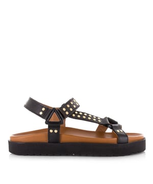 
<p>Maak kennis met de Kodiak van DWRS label – een stijlvolle en edgy toevoeging aan je zomergarderobe. Deze dames sandalen in klassiek zwart zijn gemaakt van hoogwaardig leer, waarbij ook de binnenkant van leer is afgewerkt voor een luxe en comfortabele feel.</p>
<p>Wat de Kodiak echt bijzonder maakt, zijn de subtiele studs die langs de bandjes lopen. Ze geven deze damesschoenen een stoere en trendy uitstraling, zonder in te boeten aan elegantie. De perfecte balans tussen vrouwelijk en krachtig!</p>
<p>Het zachte voetbed zorgt voor optimaal comfort, zelfs tijdens lange zomerse dagen. Of je nu gaat voor een casual city look of een chique avondoutfit, deze sandalen zijn veelzijdig en stijlvol. Dankzij de minimalistische vormgeving en hoogwaardige afwerking zijn ze gemakkelijk te combineren met vrijwel elke outfit – van maxi-jurken tot denim shorts.</p>
<p>De Kodiak sandalen zijn een must-have voor vrouwen die houden van comfortabele schoenen met een fashionable twist. Laat je voeten stra