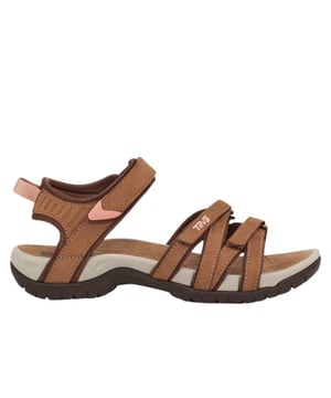
Teva Tirra Sandalen Dames Bruin

 De Teva sandalen voor dames zijn de perfecte keuze voor vrouwen die op zoek zijn naar comfortabele en stijlvolle sandalen voor de warmere dagen. Deze sandalen hebben een prachtige groene kleur en zijn gemaakt van hoogwaardig foam materiaal, waardoor ze zeer licht en duurzaam zijn. Het product heet Tirra en heeft een eigentijds ontwerp dat zowel praktisch als modieus is. De sandalen hebben een verstelbare klittenbandsluiting, waardoor ze perfect passen op elke voet. Het zachte voetbed biedt de hele dag door comfort en de rubberen zool zorgt voor uitstekende grip op elke ondergrond.

 Teva Tirra Sandalen Dames

 De Teva sandalen voor dames in Tirra-uitvoering zijn ideaal voor verschillende activiteiten, van wandelen tot stedentrips en van het strand tot de bergen. De sandalen zijn niet alleen comfortabel, maar ook stijlvol genoeg om bij elke outfit te passen. Als je op zoek bent naar comfortabele en duurzame