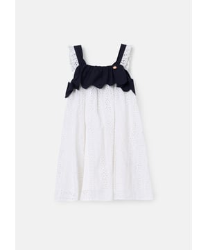 This summer dress combines timeless broderie fabric with standout details. Featuring a frill scalloped yoke and delicate frill straps. it’s finished with a dramatic black border on crisp   for a striking contrast. Dress up or down but always stay stylish.