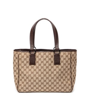 Gucci Taschen Shoulder Tote  Umhängetasche und Braun/Beige Leinwand und Silber hardware. Das Produkt ist auf in sehr gutem Zustand (AB).
  Abmessungen: 33x25x12 cm 
  Zubehör inklusive: None
  Äußere Hinweise: Leicht abgewetzte Paspeln, Außenseite leicht zerknittert
  BrandCo Paris hat seltene Artikel und die besten Konditionen zu unglaublichen Preisen vorgestellt. Geduld lohnt sich! Kaufen Sie mit Vertrauen: Alle Artikel von BrandCo Paris sind von unserem Expertenteam ausgewählt und authentisch.
  Alle Artikel enthalten ein Echtheitszertifikat und wurden von BrandCo Paris übernommen.
  Tabelle zur Klassifizierung des Artikelzustands
  N (wie neu)
  AA (perfekter Zustand)
  A (ausgezeichneter Zustand)
  AB (sehr guter Zustand)
  B (gut/mittelmäßig)