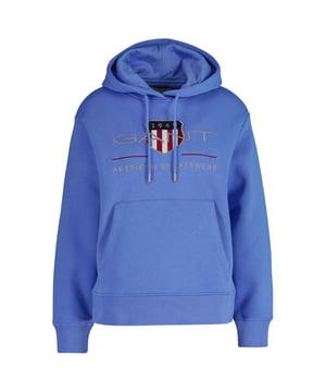 Stylischer Hoodie für Damen von der Marke GANT. Angenehm weicher Baumwoll-Mix, große Logo-Wappen-Stickerei, Känguru-Tasche, Kapuze mit Kordelzug.