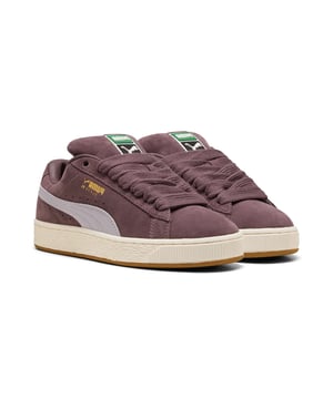 Sneakers featuring a premium suede upper for a sleek and stylish look. Debossed and foil-printed PUMA branding on the quarter panel adds a touch of sophistication. Finished with a durable rubber sole for reliable traction and comfort.