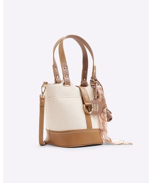 Grab handles, Detachable cross body strap, Branding, Mini bag tag, Scarf tie detail, Zip fastening, Canvas fabric, Handle drop: 20cm, H: 22cm x W: 28cm x D: 19.5cm