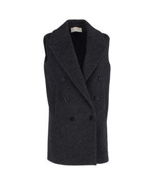 VINTAGE, RRP AS NEW
Make a bold style statement with the Stella McCartney Double-Breasted Vest Jacket in sophisticated grey wool. This tailored vest jacket offers a modern twist on classic tailoring, featuring a sharp double-breasted design that exudes both power and elegance. Crafted from luxurious wool, it offers a smooth, refined finish while providing warmth and structure. The sleek, sleeveless silhouette is perfect for layering over shirts, blouses, or dresses, adding a polished, fashion-forward touch to any outfit. Whether dressed up for the office or paired with casual pieces for a chic weekend look, this versatile vest jacket is a must-have for the contemporary wardrobe.

 Stella Mccartney Double-Breasted Vest Jacket in Grey Wool

Condition: Excellent
Signs of wear: No retail tag but Brand tag on., No visible sign of wear., 
Packaging: None
Color: Grey
Material: Wool
Size: IT | 42/UK12/FR38M/US6-8
Measurements: Length: 830; Chest: 500
SKU: NAPPUGBCL432749W