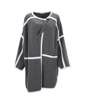 VINTAGE, RRP AS NEW
The Chloé Angora Blanket Coat in Gray Wool is a luxurious and cozy outerwear piece that offers both style and warmth. Crafted in Italy, this weighty coat is made from soft wool with contrasting white angora inserts, adding a unique and chic touch to the design. The neutral gray color palette makes it supremely versatile, allowing it to effortlessly complement various outfits. This blanket coat exudes sophistication and can be styled with both shirts and fine-knit sweaters, offering a high level of versatility in creating different looks. Its combination of luxury materials and timeless design makes it a statement piece in any winter wardrobe.



Chloé Angora Blanket Coat in Gray  Wool
Condition: Excellent
Signs of wear: , No visible sign of wear.
Packaging: None
Color: Grey
Material: Wool/hair | laine
Size: XS
Measurements: Length: 880; Chest: 1600
SKU: NAPPUUSCL404128W