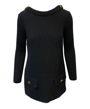 VINTAGE, RRP AS NEW
Dolce & Gabbana has created this collection by giving 90s looks a contemporary edge. This new expression of the brand's signature aesthetic emphasizes the new cuts, volumes and details while retaining key details: femininity and tailoring. This double-breasted jacket with low back and will add a touch of character to your looks: Shawl collar, Long sleeves Flap pockets angd gold buttons on shoulders and at the back.

Dolce & Gabbana Low Back Dress Coat in Black Polyester
Color: black
Material: Polyester
Size: IT40/FR38
Condition: excellent
Sign of wear: No
SKU: 95372