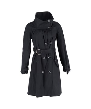 VINTAGE, RRP AS NEW
The Stella McCartney Double-Breasted Belted Trench Coat in black cotton offers a modern take on a timeless classic, combining sharp tailoring with sustainable craftsmanship. Its structured silhouette, cinched waist, and bold lapels create a powerful, polished look for any season. **Styling tip:** Layer it over wide-leg trousers and loafers for a sleek, city-ready ensemble.

 Stella Mccartney Double-Breasted Belted Trench Coat in Black Cotton

Condition: Very good
Signs of wear: Minor tarnishing of buttons., Minor sign of wear or markings., Lightly used but very well maintained. Small pull thread or light peeling.
Packaging: None
Color: Black
Material: Cotton | cotton 
Size: EU | 40
Measurements: Length: 1020; Chest: 400
SKU: NAPPUGBCL542233W
