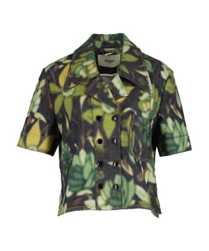 VINTAGE, RRP AS NEW
Embrace the vibrant energy of summer with the Fendi Floral Buttoned Short Sleeve Jacket, a chic and playful addition to your seasonal wardrobe! Crafted from cotton denim adorned with a delightful floral motif, this jacket is a breath of fresh air. The collar, double-breasted button detail, and short sleeves add a touch of sophistication to this trendy piece. Stand out from the crowd and embrace the joy of summertime fashion with this stylish jacket.  Fendi Floral Buttoned Short Sleeve Jacket in Green Cotton Color: Green Material: Cotton Condition: Excellent Signs of wear: No visible signs of wear Size: IT44 Measurements: Length: 580; Chest: 480 SKU: 367566