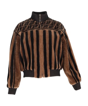 VINTAGE, RRP AS NEW
The Fendi Monogram Bomber Jacket in rich brown lamb fur is the ultimate statement in luxe outerwear. Featuring Fendi’s signature print, a stand collar, and sleek slit pockets, this zip-up silhouette blends cozy texture with unmistakable high fashion. It’s an evening jacket with undeniable edge.


Fendi Monogram Bomber Jacket in Brown Lamb Fur
Condition: Excellent
Signs of wear: No retail tag but Brand tag on., No visible sign of wear., 
Packaging: None
Color: Multicolor | multicolor
Material: Fur | Lamb fur
Size: INT | S
Measurements: Length: 580; Chest: 540
SKU: NAPPUGBCL529017W