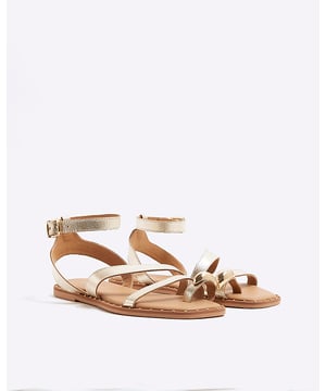 Flat soles, Round open toe, Toe clip detail, Stud detail, Ankle strapped, Buckle fastening