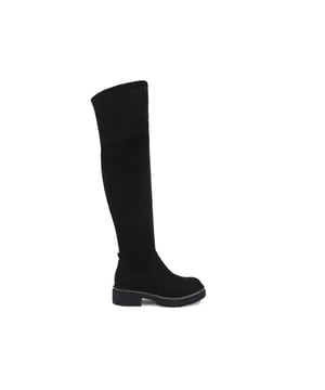 This Tiff Over Knee Boot features a soft microsuede upper. The sole is surrounded by gunmetal crystals and is extra chunky.
