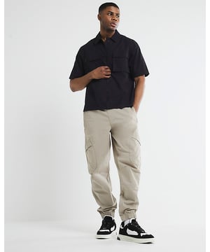 Regular fit, Utility pockets, Zipped side pockets, Elasticated drawstring waistband