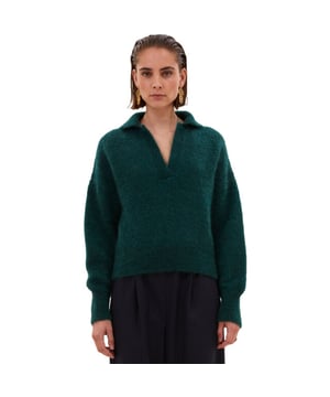 
Polo Pullover Dark Green is een poloshirt van het merk BY-BAR in de kleur groen.