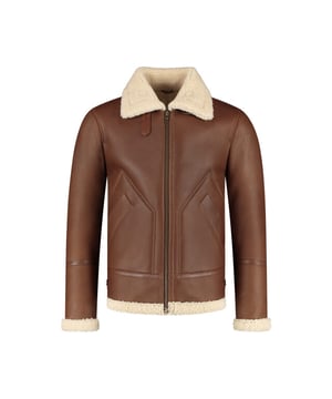 
Indulge in the rich legacy of craftsmanship with the Hunter Shearling Coat, a luxurious nod to one of the oldest and most iconic garments in human history. Dating back to the very beginnings of civilization, early humans relied on animal hides for protection against the elements, wearing sheepskins with both the wool and leather intact for unparalleled warmth. This primitive yet ingenious design evolved through the centuries, from the cold regions of ancient Europe and Asia, to the noble courts of medieval Europe. But it wasn’t until the early 20th century, during World War II, that shearling became the indispensable material of choice for aviators braving the freezing conditions of the skies​.