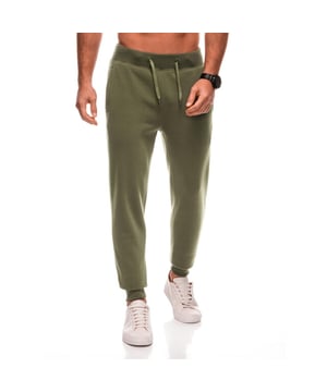 
Heren joggingbroek van het Fashion Italia merk Ombre. De mannen broek is gemaakt van zachte aangename joggingstof. Ook heeft de loungebroek heren een normale pasvorm. Deze joggingbroek heren is ideaal voor fitness en casual gebruik.

 Heren joggingbroek
Tailleband afgewerkt met elastiek en extra trekkoord
Licht isolerende werking
Gemaakt van rekbaar materiaal
Materiaal: 76% polyester, 22% katoen, 2% elastaan
Kleur: Olijfgroen
Lengte model: 189 cm.
Het model presenteert het product in maat: M

 Artikelnummer: 0108-V2-OG Houd je joggingbroek langer mooi!
Was joggingbroek binnenstebuiten op maximaal 30°C met gelijksoortige stoffen of in een waszak. 
Samen wassen met (ruwe) handdoeken of spijkerstof veroorzaakt slijtage en pluisvorming
Gebruik een mild wasmiddel en geen wasverzachter. 
Gebruik geen wasdroger. Centrifugeer op een lager toerental.
Laat daarna aan de lucht drogen op een droogrek.