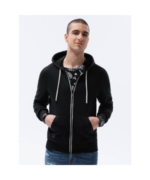 
Zwart heren vest met capuchon. Het vest is voorzien van een capuchon met trekkoord. Ook is dit vest voor mannen voorzien van een ritssluiting. Twee zijzakken. Onderkant van het sweatshirt en mouwen afgewerkt met boorden. Subtiel logo-embleem. Perfect geschikt voor casual looks.

 Materiaal: 65% katoen, 35% polyester
 Kleur: zwart
 Merk: Ombre

 De lengte van het model op de foto is 185 cm en draagt maat M