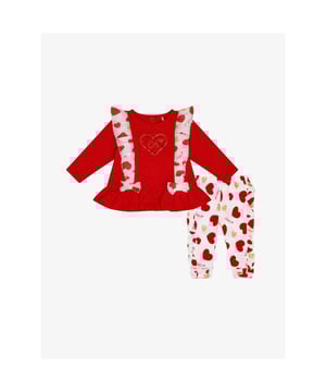 
2-delige meisje baby set. Set bestaat uit een rode tuniek met ruches en hartjes en een bijpassende hartje legging