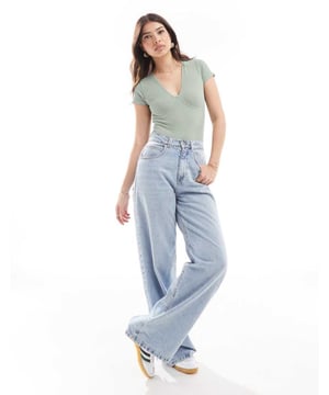 Tops by ASOS DESIGN A silhouette serve V-neck Short sleeves Cup details Bodycon fitSold By: Asos