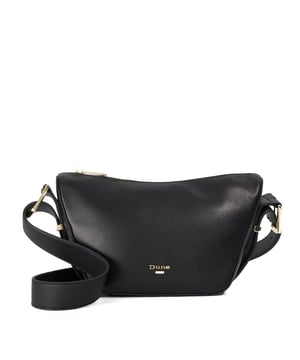 Crafted from soft suede, Delicately is a shoulder bag on every woman's wishlist. Boasted polished gold-tone hardware and a buckled shoulder strap, the zip closure opens to a thoughtfully designed interior, with space for your phone, glasses and more.