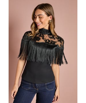 Sleeveless ponte top with dramatic tassel embellishment across the shoulders
        Elegant high neckline with delicate lace overlay for sophisticated detailing
        Slim fit silhouette that contours beautifully to the body
        Statement back design featuring a keyhole opening for added allure
        Luxurious fringe detailing creates movement and dimension
    
    This striking Coast top combines timeless elegance with contemporary flair. The sleeveless design showcases a sophisticated high neckline adorned with intricate lace detailing, whilst the dramatic tassel fringe creates captivating movement with every step. The slim-fitting ponte fabric ensures a flattering silhouette that maintains its shape throughout wear. Style with tailored trousers and pointed court shoes for formal occasions such as weddings or race days, or dress down with dark denim and heeled boots for evening drinks. The versatile design transitions effortlessly from day to night, making it an essential addition to your occasion wardrobe. Add statement earrings and a clutch bag to complete this refined ensemble that will turn heads at your next special event.