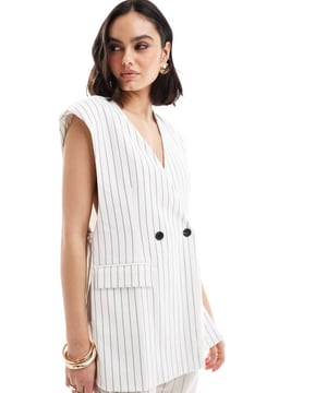 Blazers by ASOS DESIGN Curate your capsule wardrobe Stripe design V-neck Padded shoulders Double-breasted front Tie sides Flap pockets Regular fitSold By: Asos