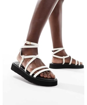 Shoes by Truffle Collection Sandal season, our favourite Adjustable strap Pin-buckle fastening Open toe Flatform soleSold By: Asos