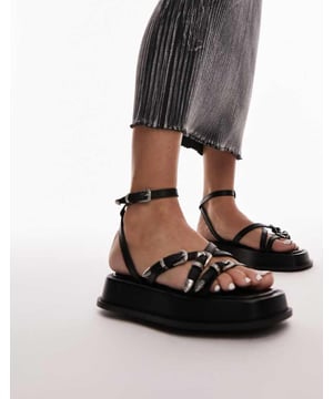 Shoes by Topshop Welcome to the next phase of Topshop Adjustable straps Pin-buckle fastening Open toe Chunky soleSold By: Asos
