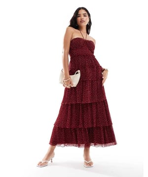 Dresses by ASOS DESIGN Master the dress code Spot design Halterneck style Shirred, stretch bust Zip-back fastening Regular fitSold By: Asos
