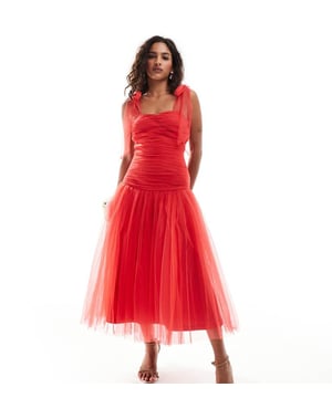 Petite by Lace & Beads Petite Occasions made easy Tie straps Drop waist Zip fastening Regular fitSold By: Asos