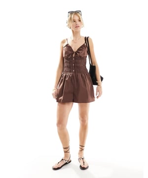 Jumpsuits & Playsuits by ASOS DESIGN Your no effort, effort-maker V-neck Adjustable straps Shirred waist Button placket Regular fitSold By: Asos