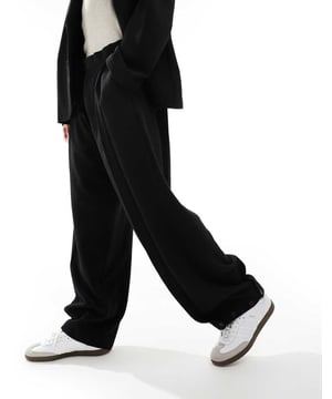 Trousers & Chinos by ASOS DESIGN You choose the occasion Regular rise Concealed fly Buttoned cuffs Wide legSold By: Asos