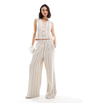 Trousers & Leggings by ASOS DESIGN Part of a co-ord set Top sold separately Stripe design Regular rise Stretch-back waistband Pockets to side Wide legSold By: Asos