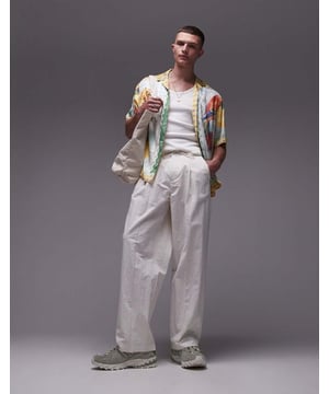 Trousers & Chinos by Topman This is Topman Regular rise Drawstring waistband Functional pockets Wide legSold By: Asos
