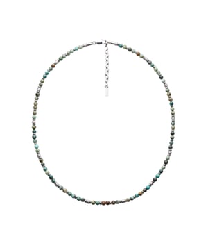 50+5 cm roestvrijstalen ketting met natuurlijke kralen van Afrikaanse dennensteen en roestvrijstalen stoppers. Gepersonaliseerd logolabel.